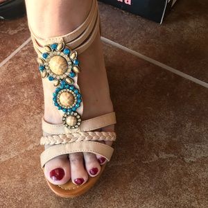 Naked color platforms w/ ornaments in front.